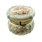 Decorative ceramic box with floral patterns on a white background