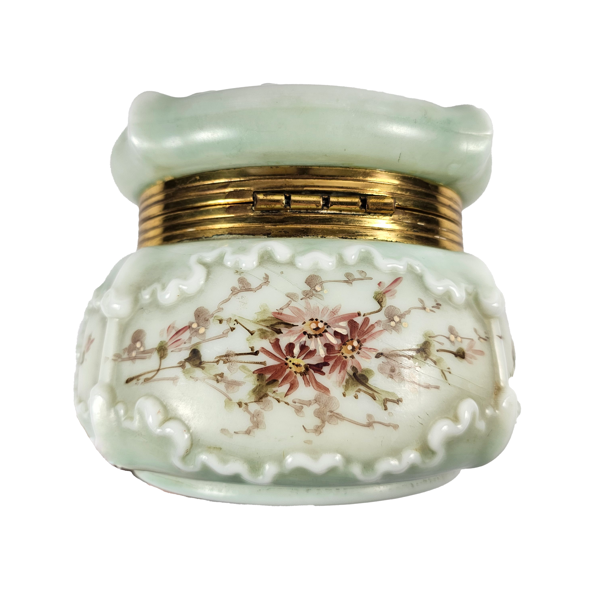 Decorative ceramic jar with floral design and gold accents on a white background