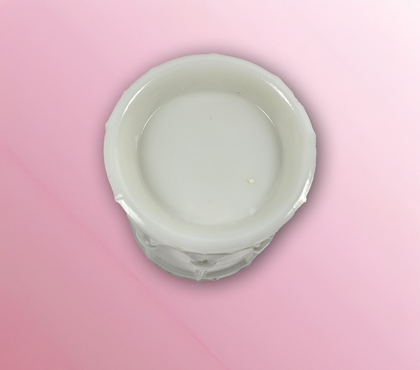 Bottom of a milk glass candy container