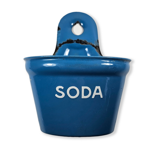 Blue enamel container 'SODA' text on a white background