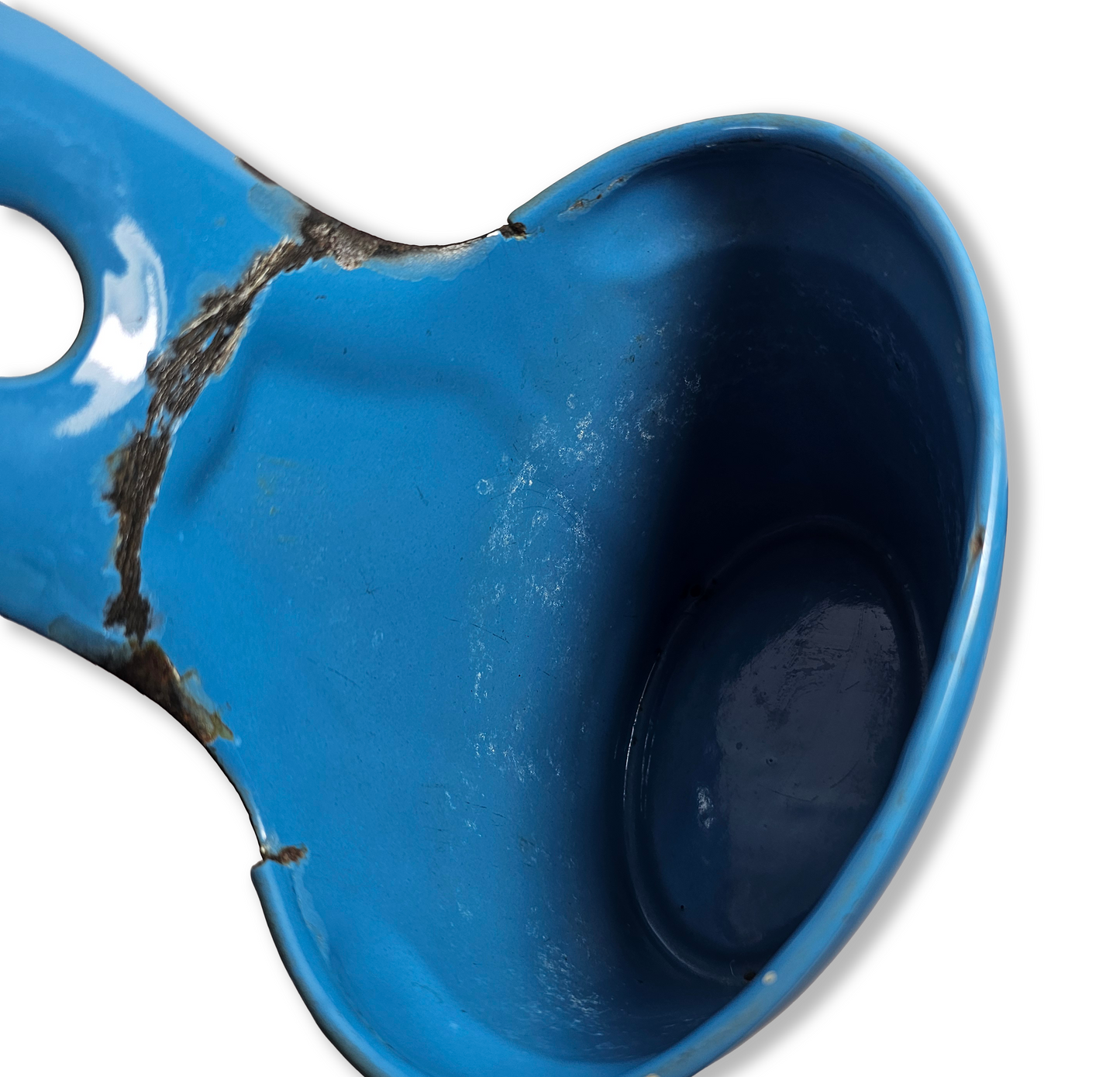 Close-up of a Vintage Blue Enamel “SODA” Wall Mount Container on a white background