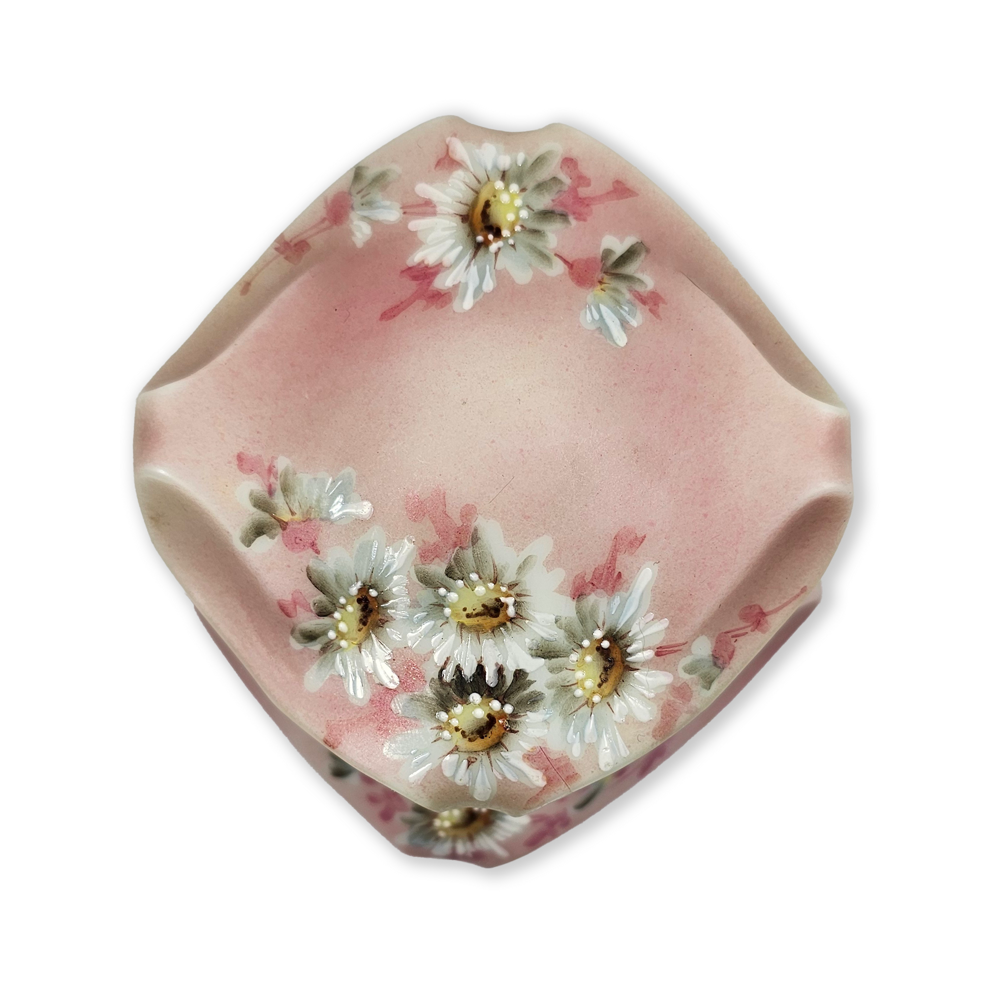 Decorative antique pink trinket box with floral patterns on a white background
