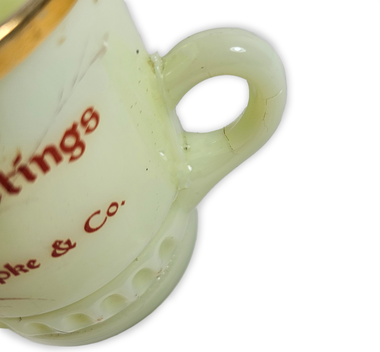 Close up of uranium glass mug vintage