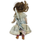 antique doll with brown hair and a lace dress on a white background