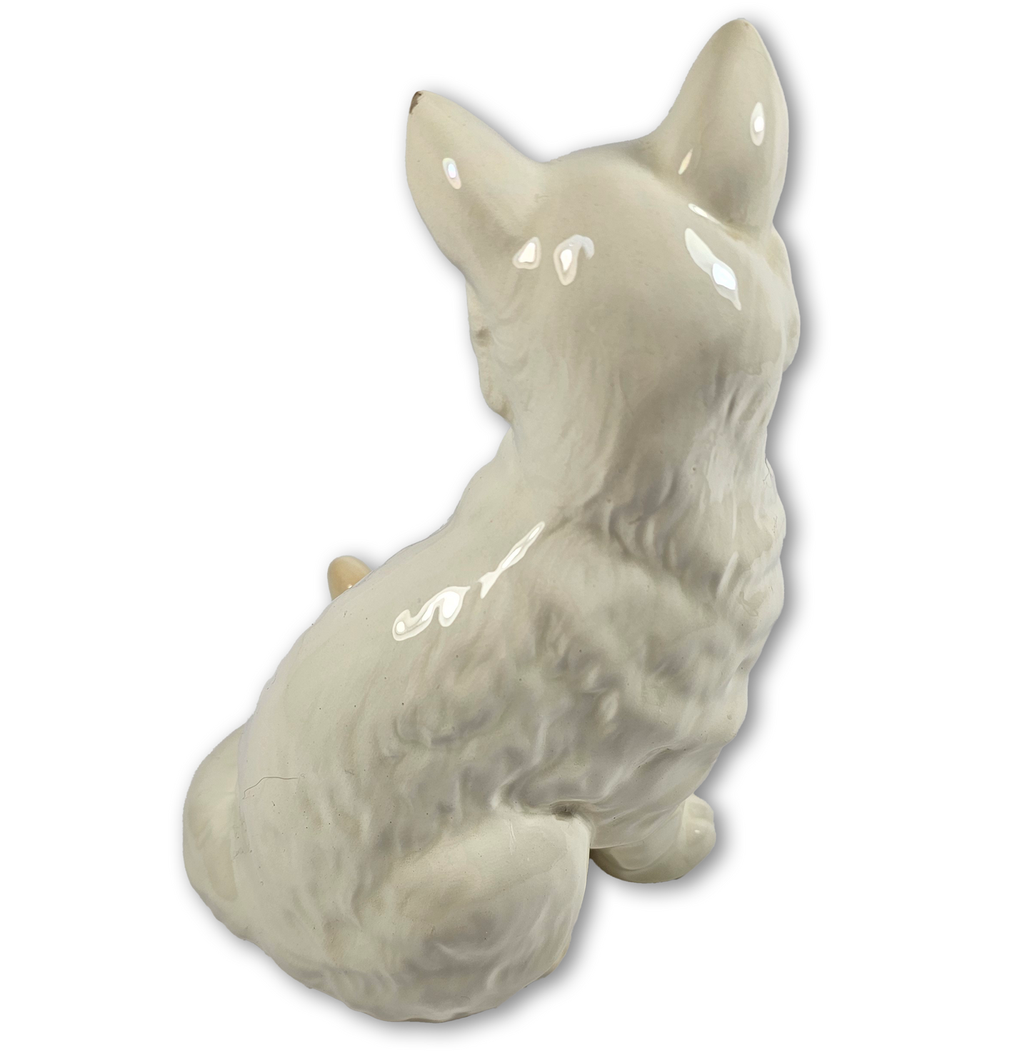 Ceramic cat figurine on a white background