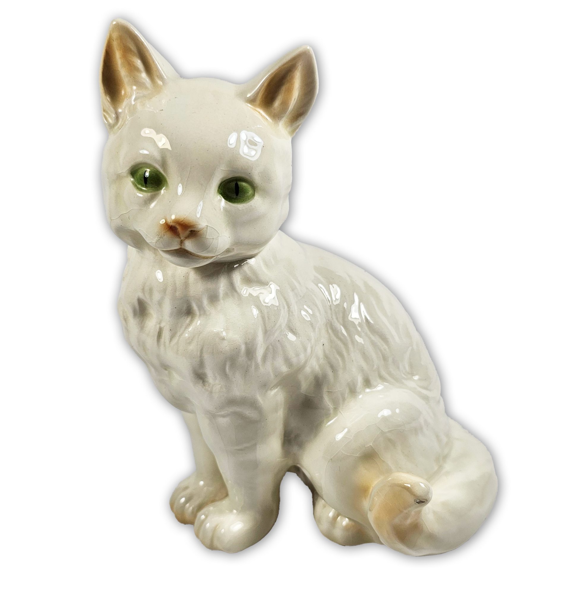 Ceramic cat figurine on a white background