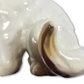 Close-up of a ceramic cat figurine with a white background