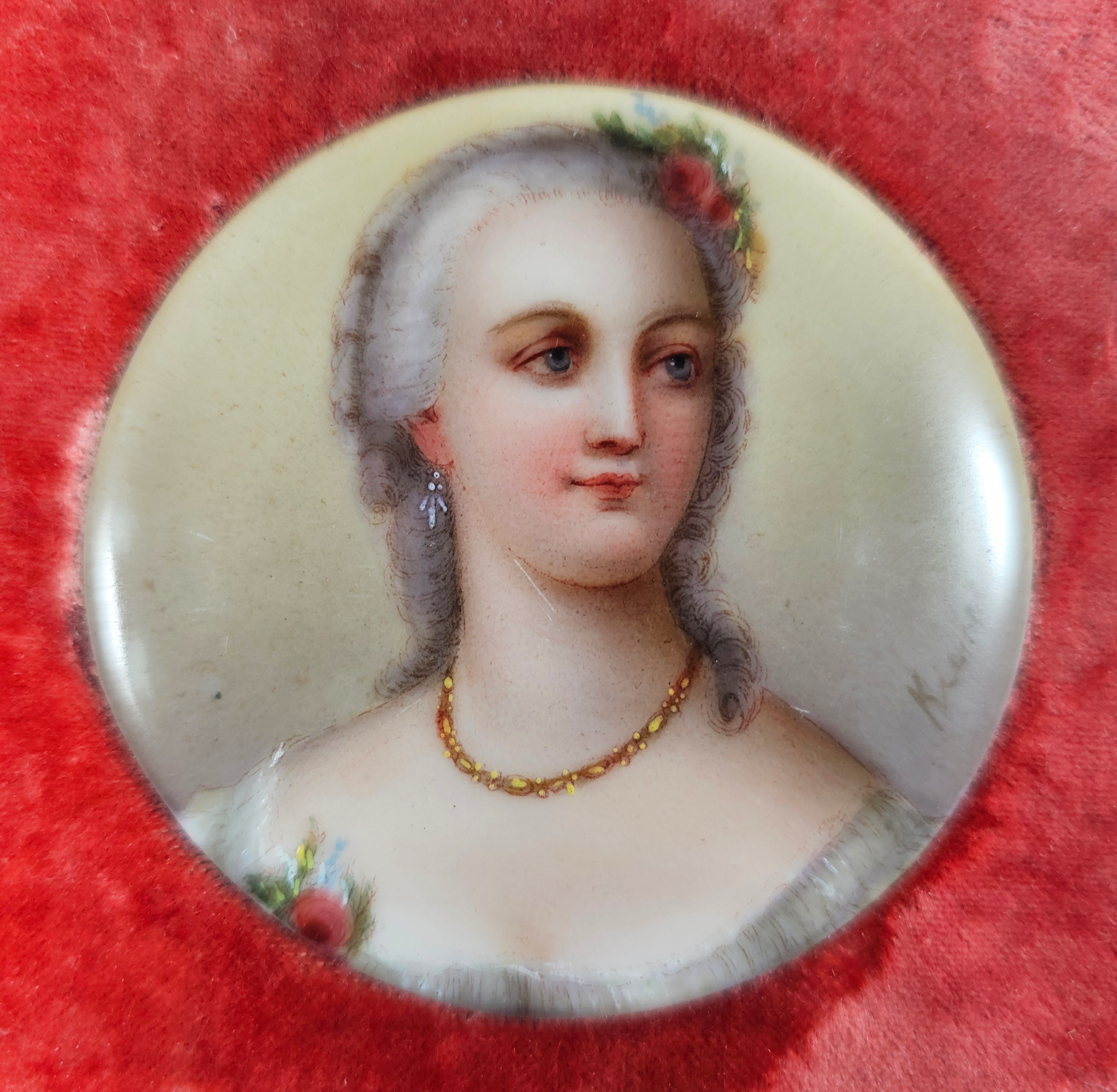 Miniature portrait of a woman with floral hairpiece on a red background