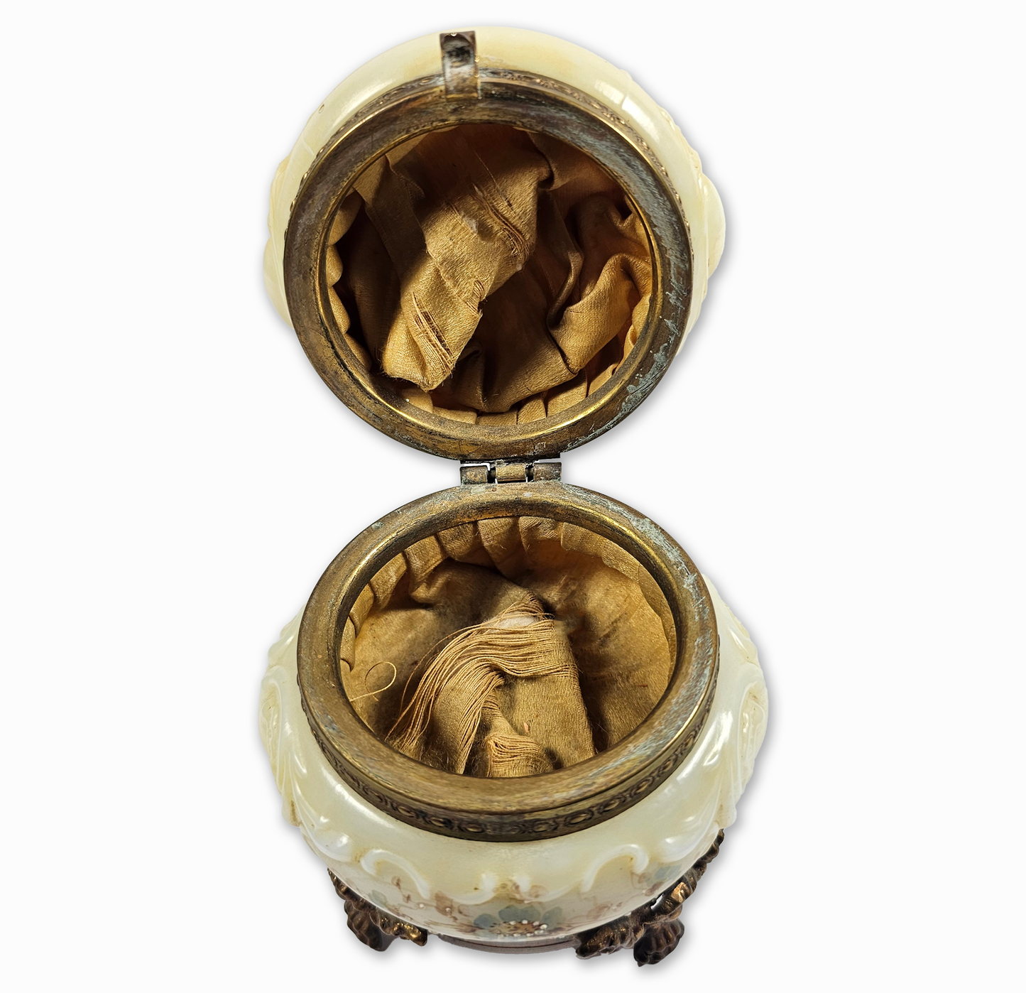 Decorative box with open lid showing embroidered fabric on a white background