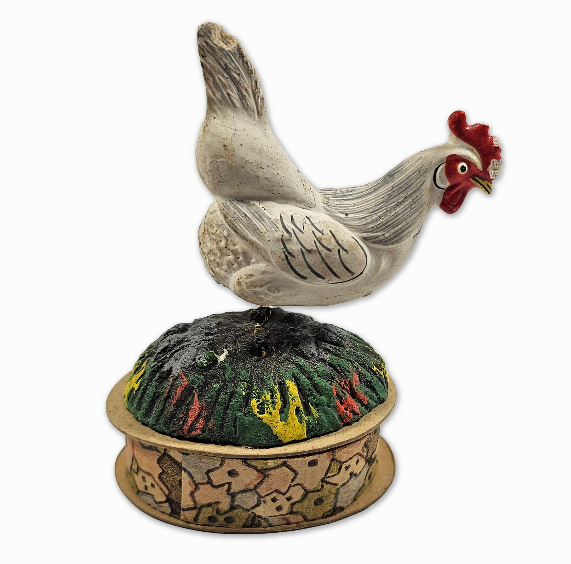 Decorative rooster-shaped box with a colorful lid on a white background