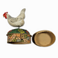 Decorative box shaped like a rooster with a colorful lid on a white background