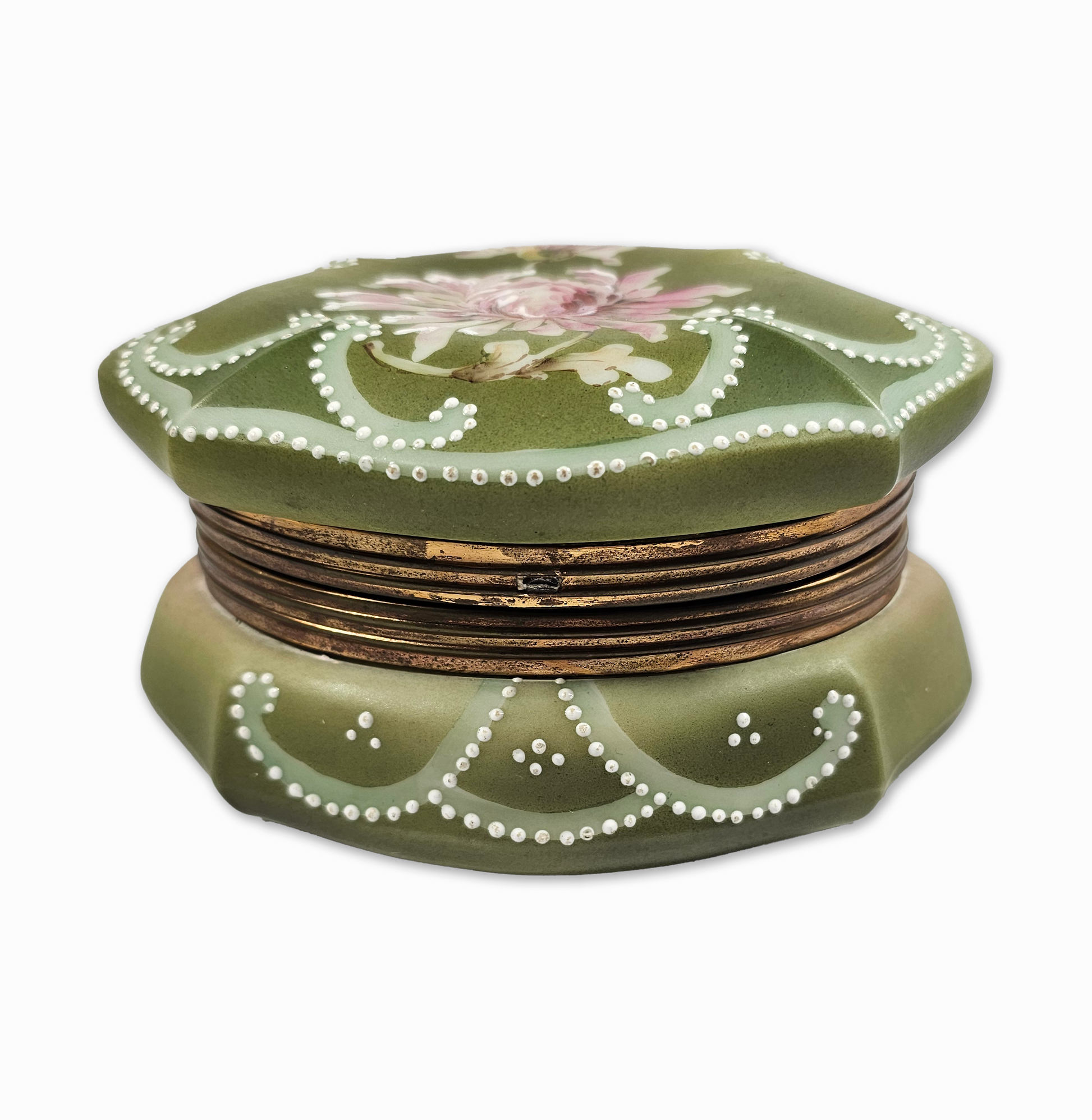 Decorative green box with floral design on a white background