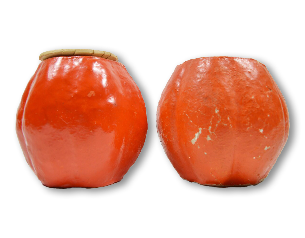 Back of Vintage pair of paper mache Halloween jack o lanterns