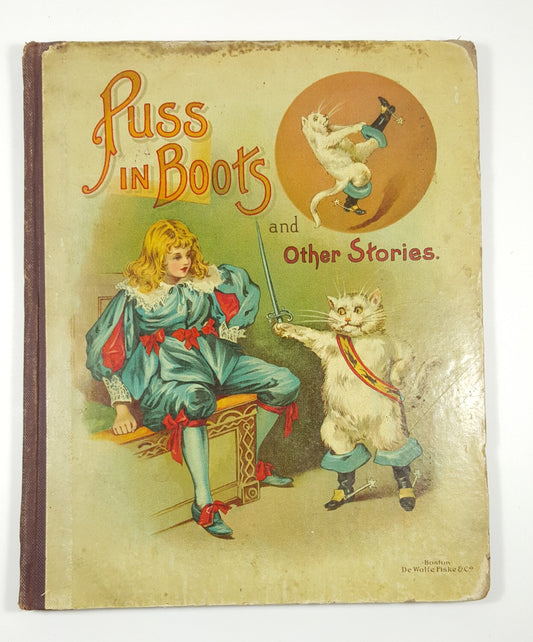 Vintage book cover of 'Puss in Boots and Other Stories' with a illustration of a girl and cat.