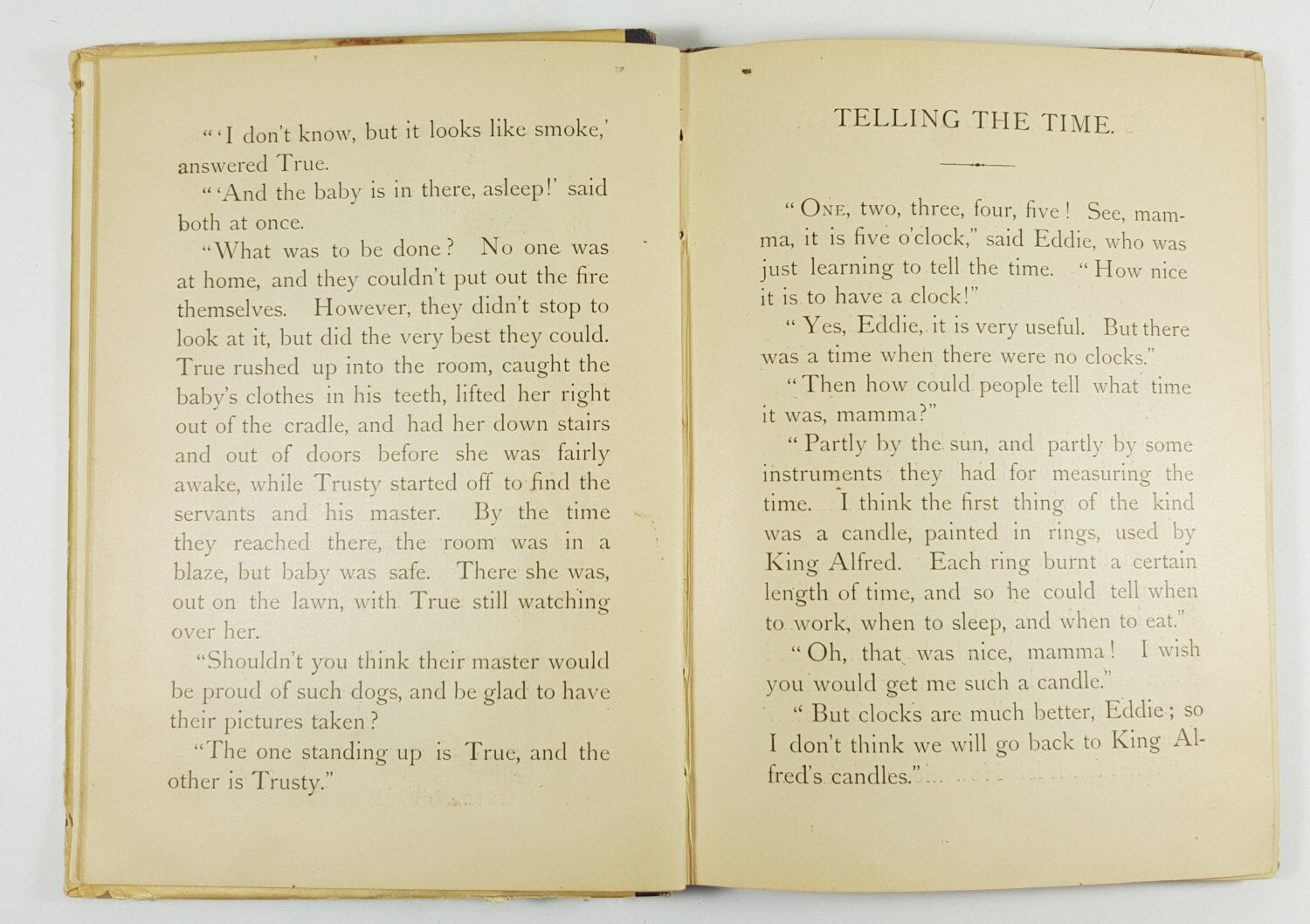 Open book with text on a white background